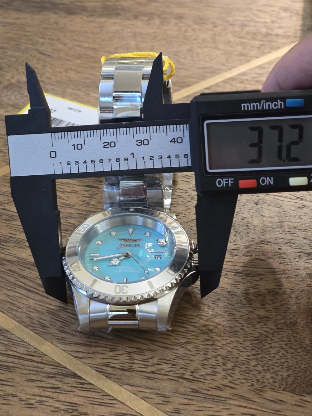 Invicta Men’s Professional Turquoise Dial Stainless Steel Dive Watch